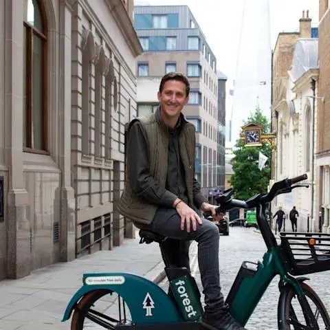 Agustin Guilisasti, Founder & CEO, Forest, on a Forest e-bike in London